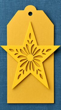 Yellow gift tag with intricate cutout star decoration