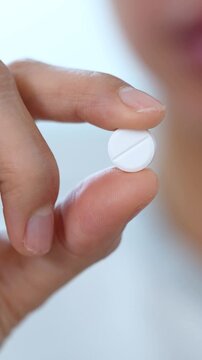 close up woman hand holding a medicine. Stop drug use Taking Medication Caring for the health care medical concept.