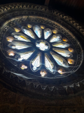 Rose Window Covered in Cobwebs in an Abandoned Church in Galicia, Spain