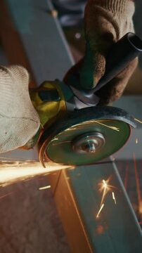 Skilled Hand Using Cutting Tool to Create Sparks While Shaping Metal in Close-Up Perspective with Emphasis on Precision and Craftsmanship