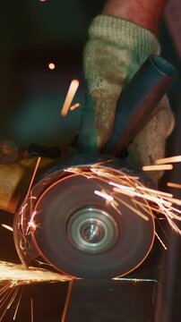 Precision Grinding Process Revealed: A Craftsman's Skill in Action Creating Sparks and Smooth Surfaces Using a Power Tool for Metal Fabrication Work