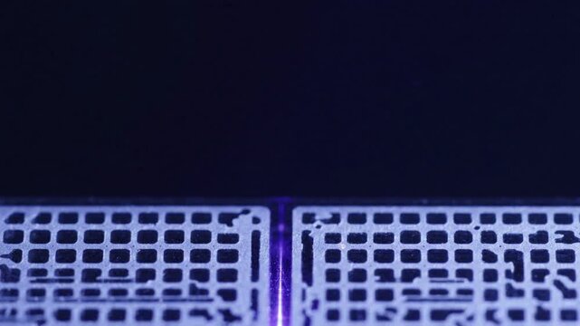 Extreme close-up of optical integrated circuit showing coherent light flow through nano channel, clean semiconductor quantum photonics concept with negative space.