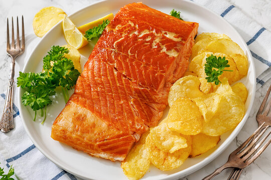 Flaky hot-smoked salmon with golden potato chips