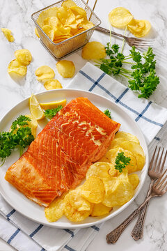 Flaky hot-smoked salmon with golden potato chips