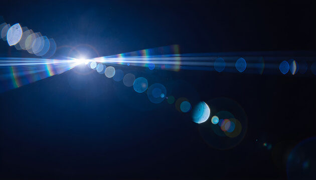 Bright lens flare with colorful bokeh lights on dark night sky background