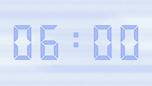 A pastel purple digital clock showing 06:00, set against a blurred pastel purple background.