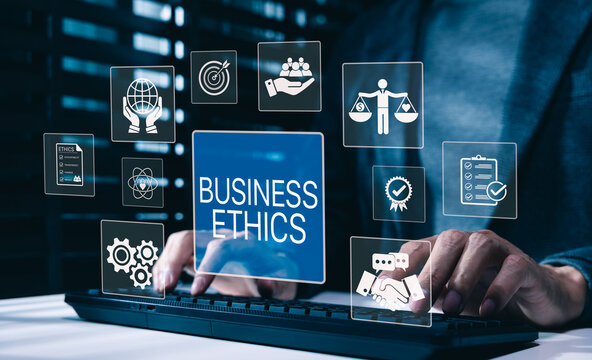 Business ethics and corporate responsibility concept. Businessman typing on keyboard with business ethics icons, compliance, integrity, ethical investment, responsibility principles, sustainable