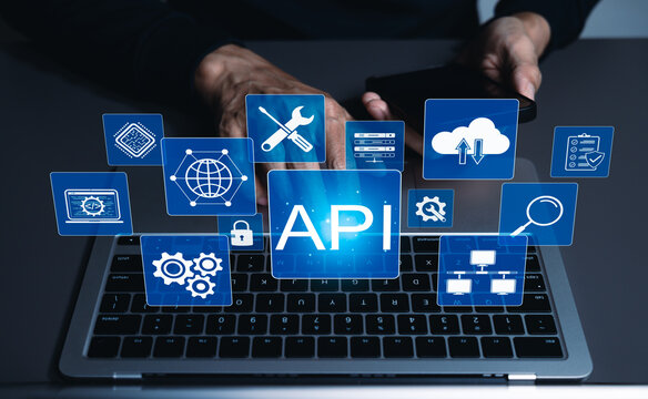 API application programming interface concept. Programmer typing on laptop with digital icons representing API development, security, and cloud computing. Application Software Tool, Web API,