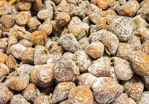 Dried Figs Covered with White Powdered Sugar or Flour on Market