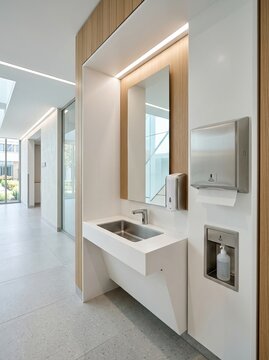 Modern Interior Design of a Contemporary Washroom with Sleek Sink and Mirror.