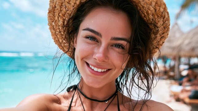 closeup shot of a good looking female tourist. Enjoy free time outdoors near the sea on the beach. Looking at the camera while relaxing on a clear day Poses for travel selfies smiling happy tropical