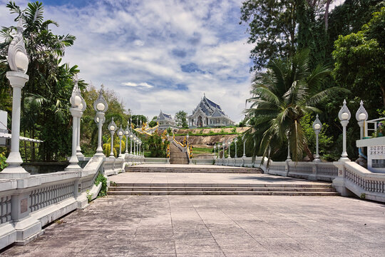 Grand white staircase leading to Wat Kaew Korawaram temple in Krabi Town, Thailand.
