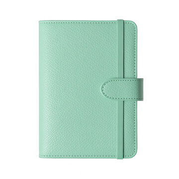 Mint green leather planner isolated on black