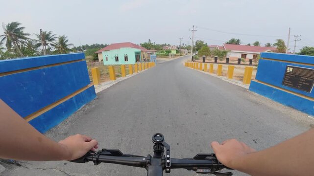 First Person View Cycling Across a Bridge