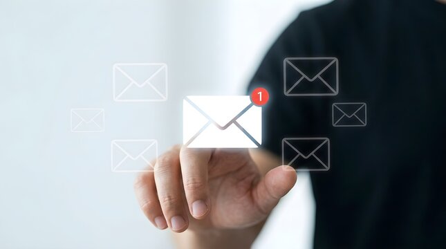 Person touching digital email icon with red notification badge on virtual interface