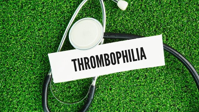 Stethoscope and paper with the word Thrombophilia is a blood coagulation disorder that increases your risk of developing abnormal blood clots thrombosis in your veins or arteries.