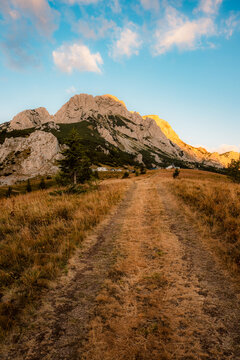 Sunset over the Maglic mountain massif seen from Prijevor saddle in Sutjeska National Park, the highest peak of Bosnia and Herzegovina at golden hour.