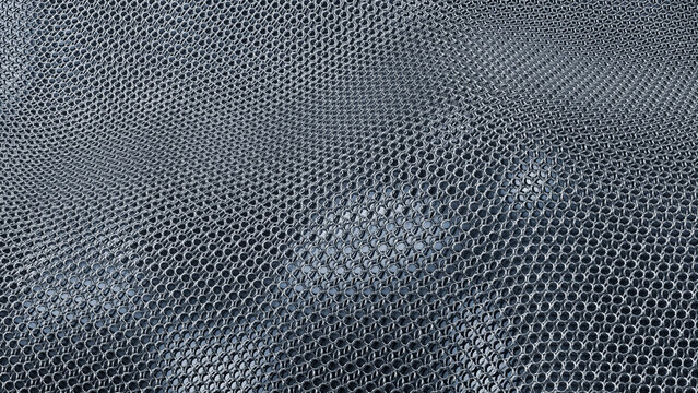 Interlinked metal rings forming historic chainmail armor pattern