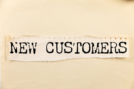NEW CUSTOMERS text on paper