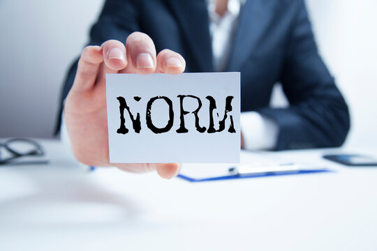 NORM word written on paper