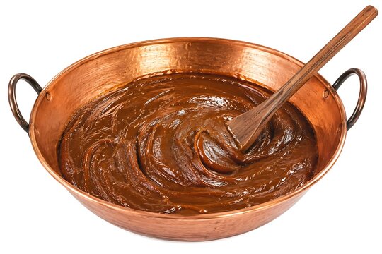 Traditional Indonesian Jenang Cooking in Copper Pan. Javanese Dodol Dessert Isolated on White