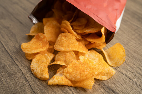Potato chips , delicious BBQ seasoning spicy for crips, thin slice deep fried snack fast food.