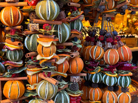 Christmas handmade decorations winter holiday garlands crafted from dried citrus fruits and fragrant spices festive holiday market. 
