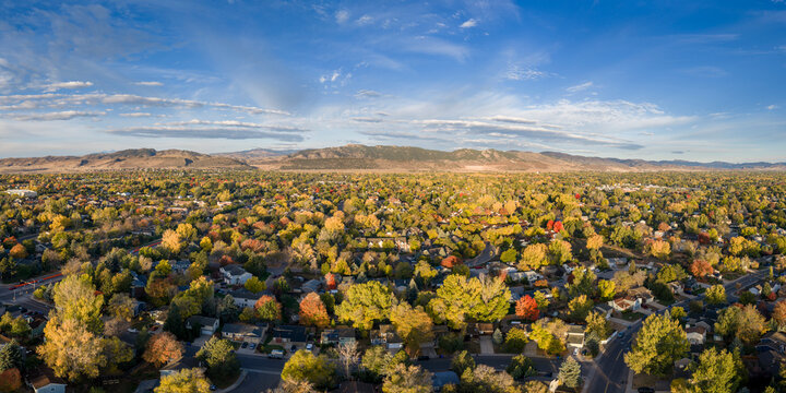 Fort Collins and foothills of Rocky Mountains in Colorado - aerial panorama of late October morning scenery