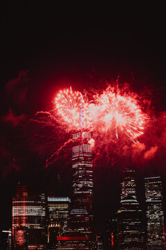 Red Fireworks Over Lower Manhattan Skyscrapers