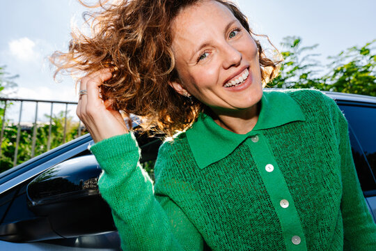 Close Up Portrait of Woman by Car