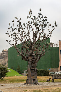 Tbilisi, Georgia, January 23, 2025: Metal Tree of Life Sculpture in Rike Park, Tbilisi, Georgia