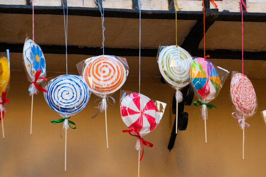 Details of colorful La Vila Joiosa town. Colorful Handmade Lollipops Decorations for a City Festival in Villajoyosa, Spain
