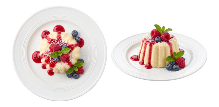 chilled coconut ice parfait topped with raspberries and blueberries on a plate