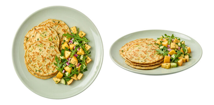pan fried leek fritters served with fresh apple salad on a ceramic plate