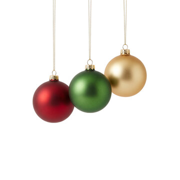 Three matte ornaments (red, green, gold) hanging from thin gold threads, empty space below for text, sharp focus, white background