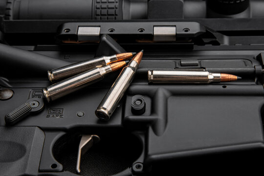 Rifle ammunition on black tactical weapon