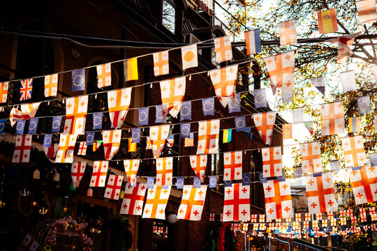 Flags of Georgia and EU seen in the streets of old town Sololaki in Tbilisi, Georgia.