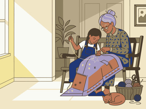 Elderly woman and young girl sitting together on a bench sewing a quilt inside a sunny room
