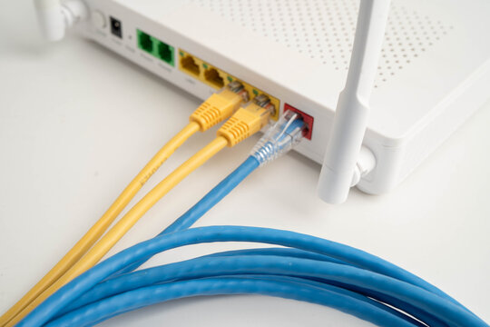 Ethernet cable with wireless router connect to internet service provider network.