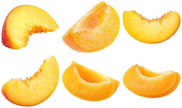 Assortment of juicy, ripe peach slices, showcasing their vibrant orange flesh and natural texture.