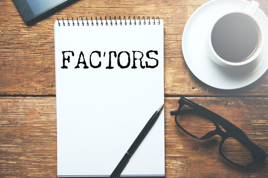 FACTORS word written on paper