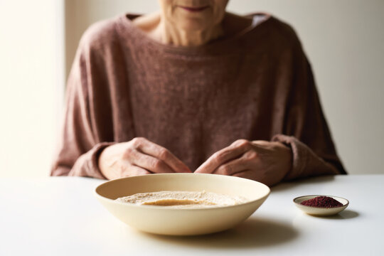 An elegant, minimalistic dish with fine grains represents simplicity in cooking and the beauty of minimalism, perfect for those who appreciate refined culinary artistry.