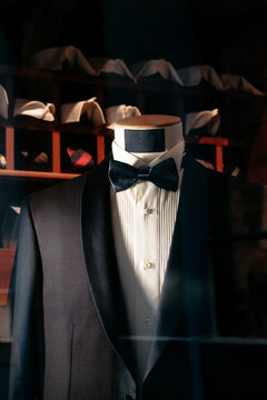 Elegant Black Tuxedo with Bow Tie on Shop Display Mannequin